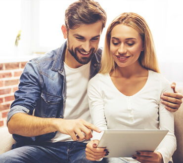 happy-couple-with-gadget-FR33W48.jpg happy-couple-with-gadget-FR33W48.jpg